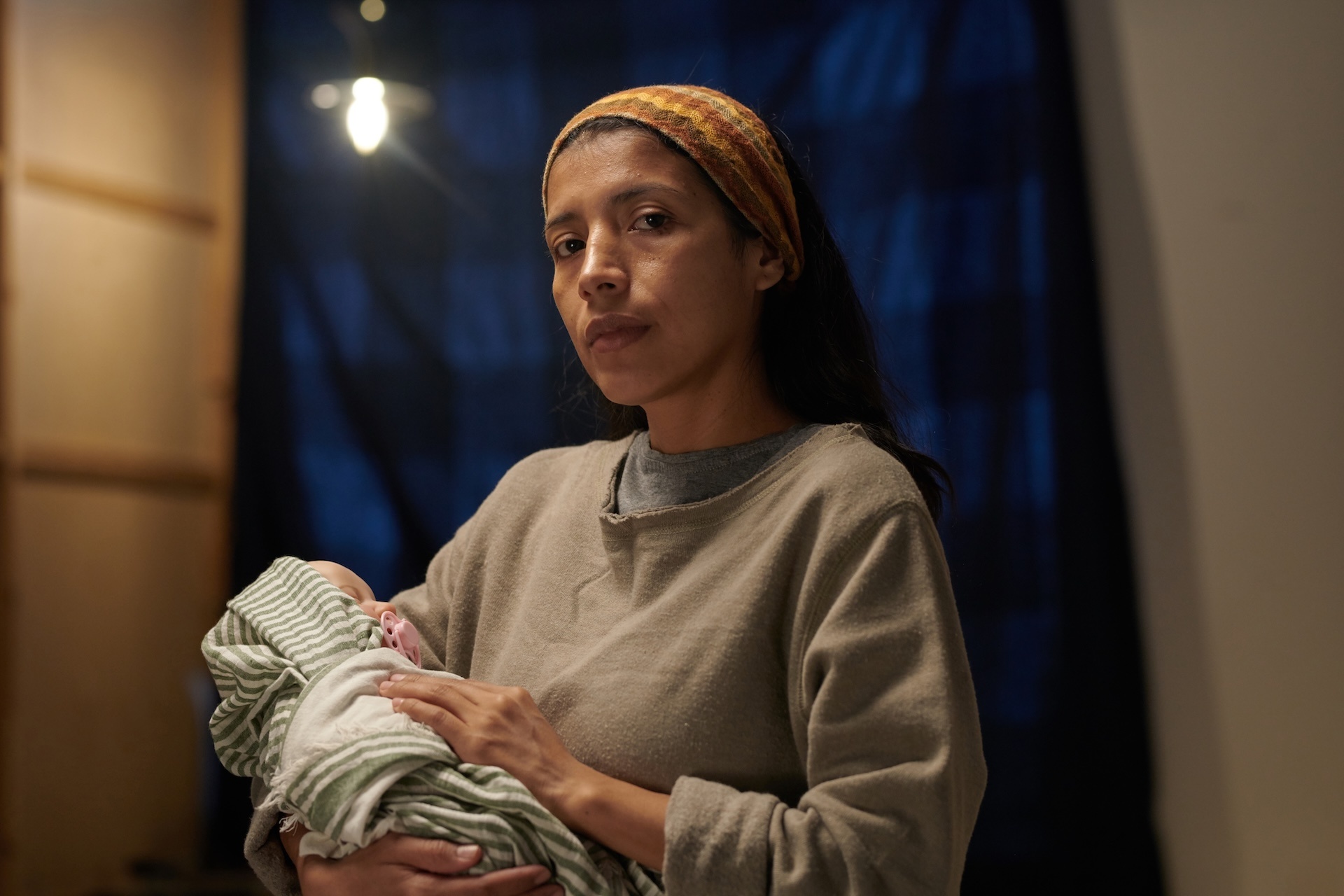 portrait-of-hispanic-mother-holding-newborn-baby-a-2024-08-13-17-41-11-utc