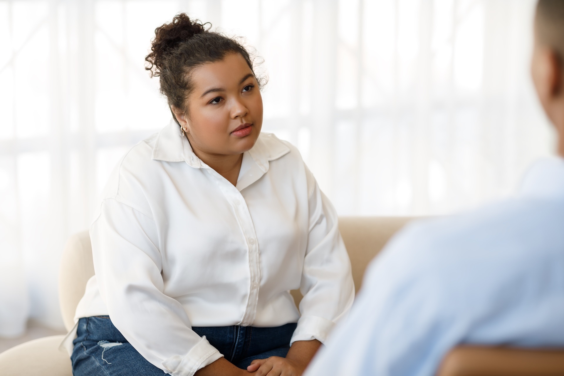 pretty-young-hispanic-lady-listening-to-her-psycho-2025-03-18-16-26-57-utc