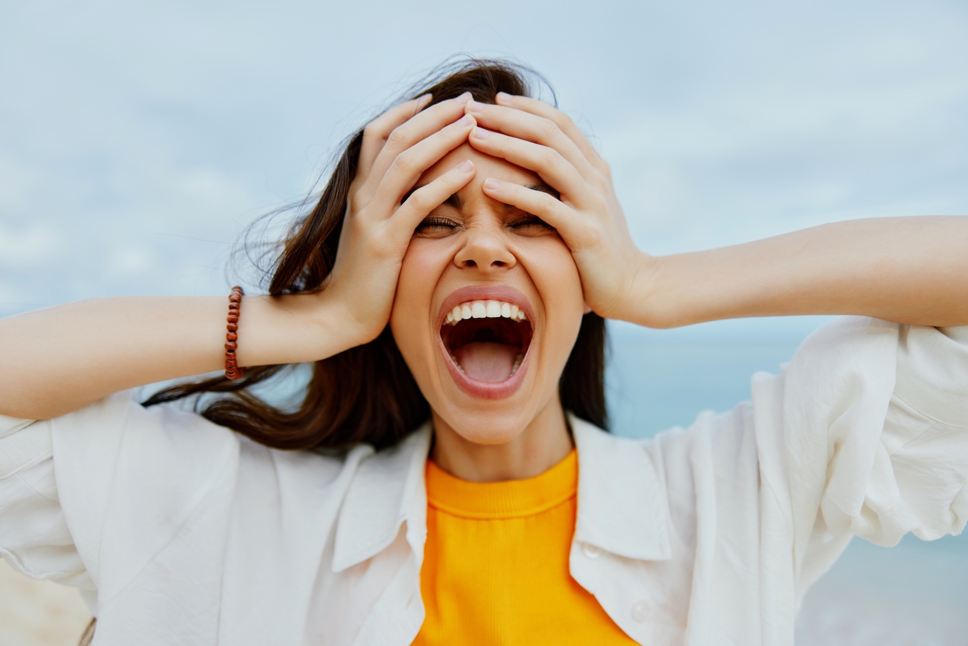 portrait-of-a-happy-woman-smile-with-teeth-with-lo-2024-05-13-19-28-52-utc