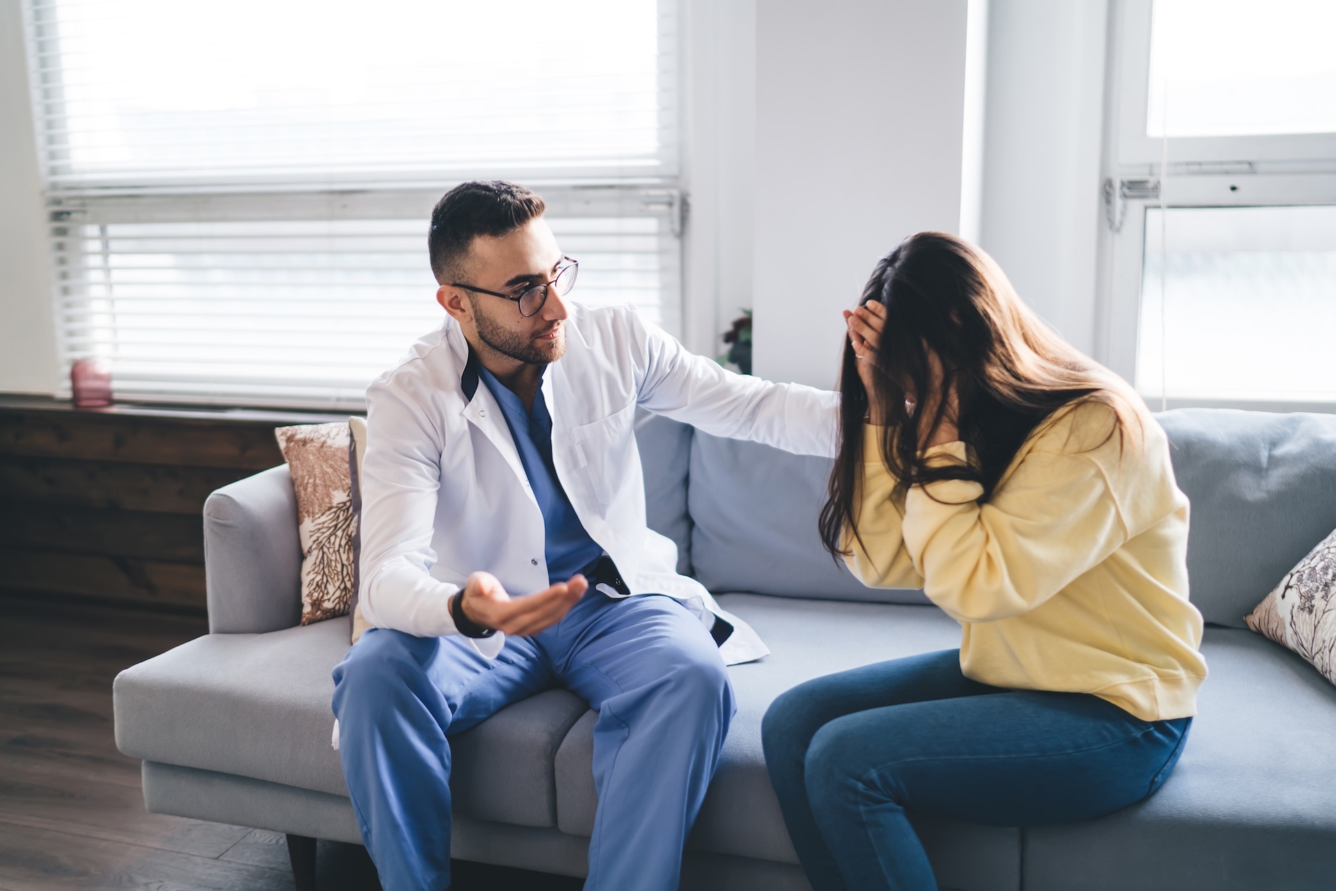 serious-male-psychotherapist-coming-down-crying-pa-2025-03-24-20-38-35-utc