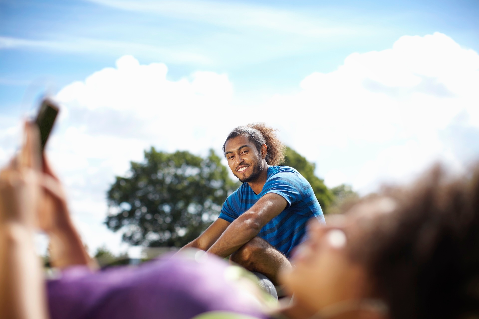 young-couple-taking-a-break-in-park-2025-04-04-21-11-39-utc