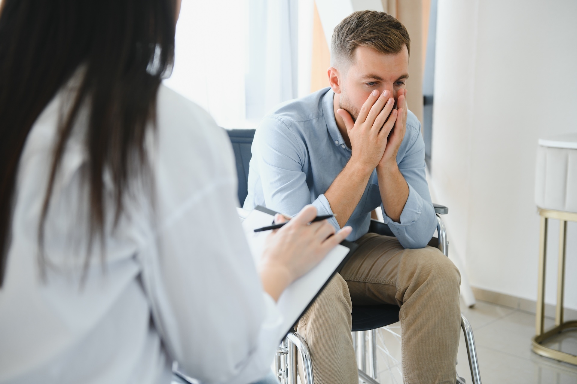 young-bearded-man-on-wheelchair-during-home-psycho-2025-03-14-14-43-44-utc