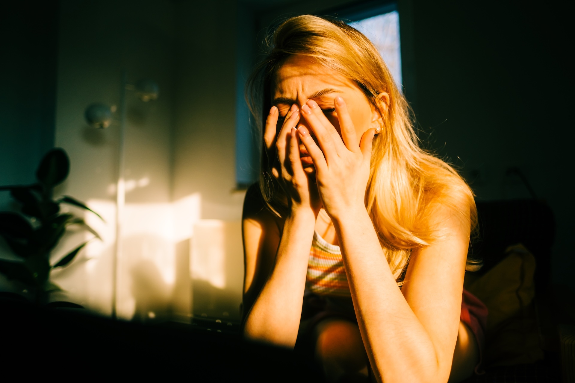 young-bored-millennial-woman-sitting-on-a-sofa-alo-2024-11-30-23-07-59-utc