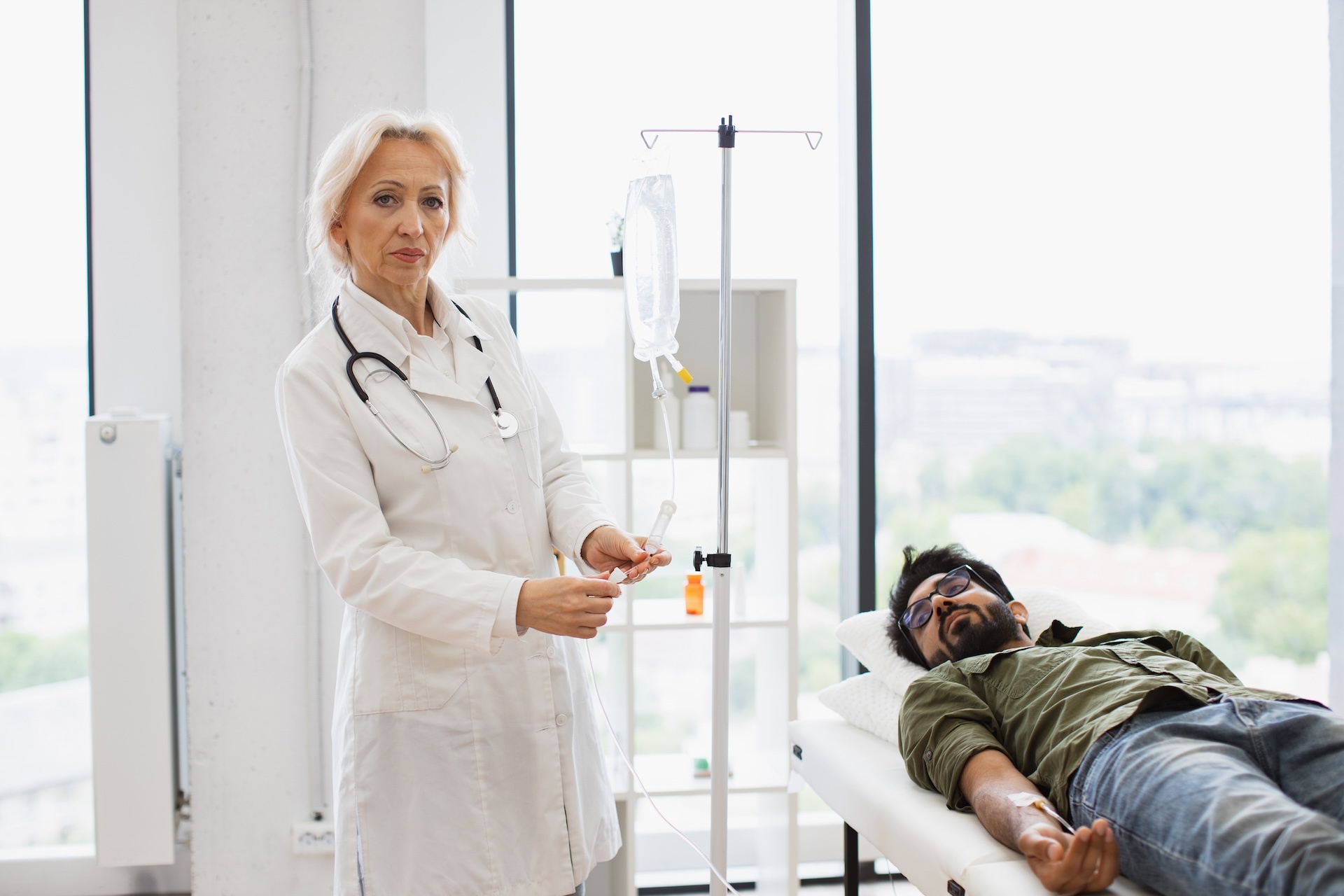 elderly-woman-in-lab-coat-testing-dropper-with-sol-2024-12-10-03-52-14-utc