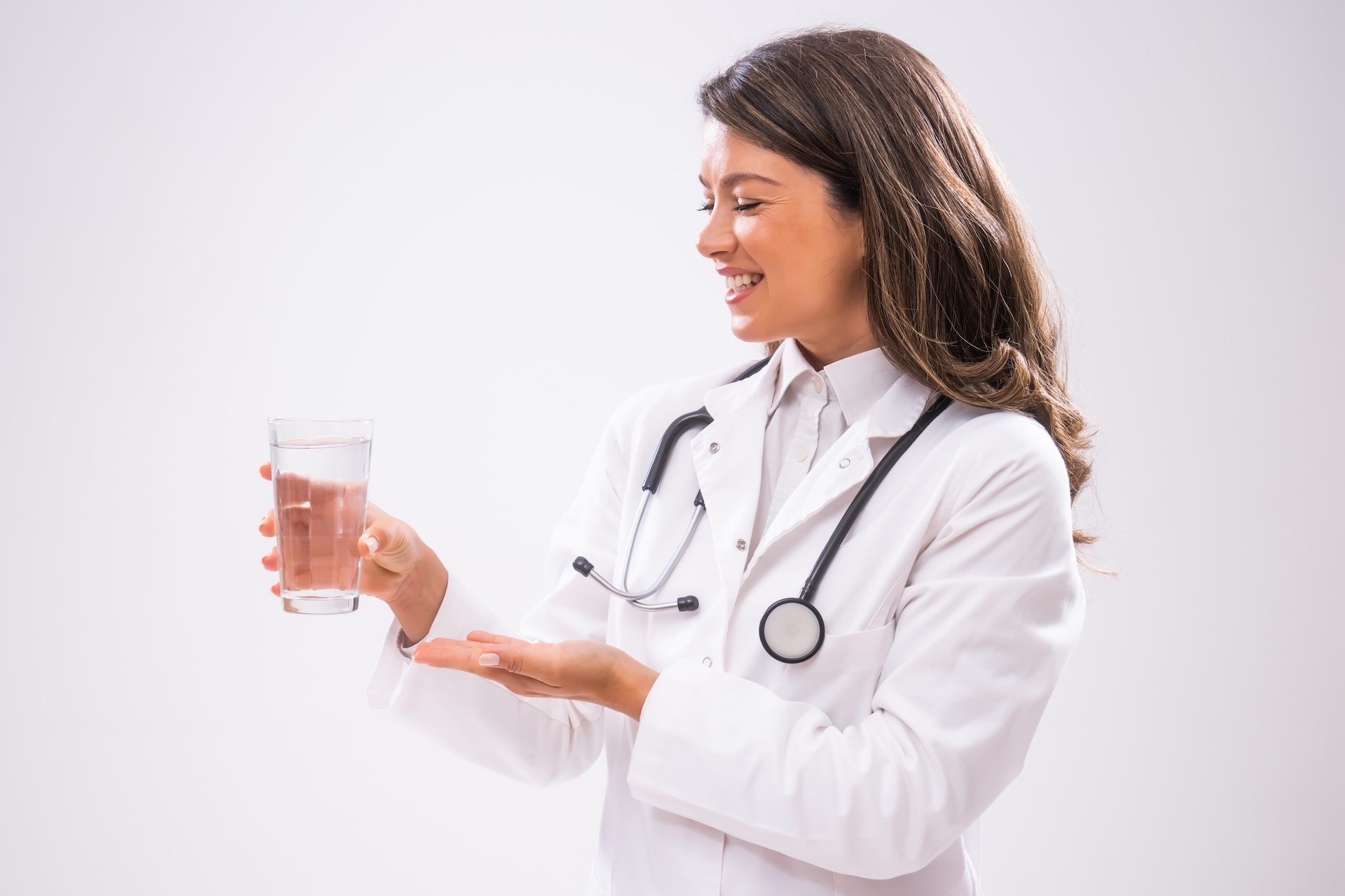 female-doctor-laughing-with-water-in-hand