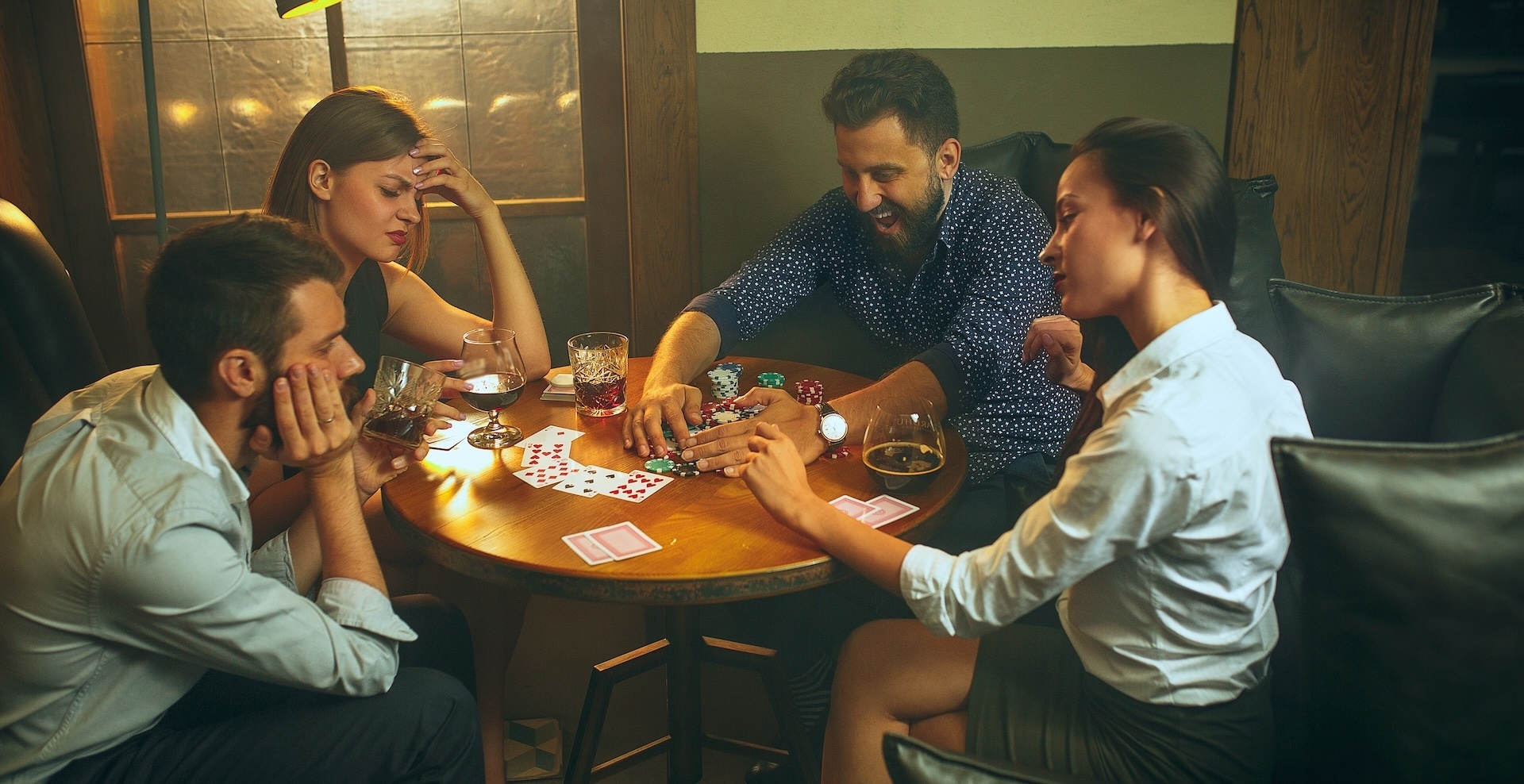 side-view-photo-of-friends-sitting-at-wooden-table-2024-10-17-11-13-48-utc