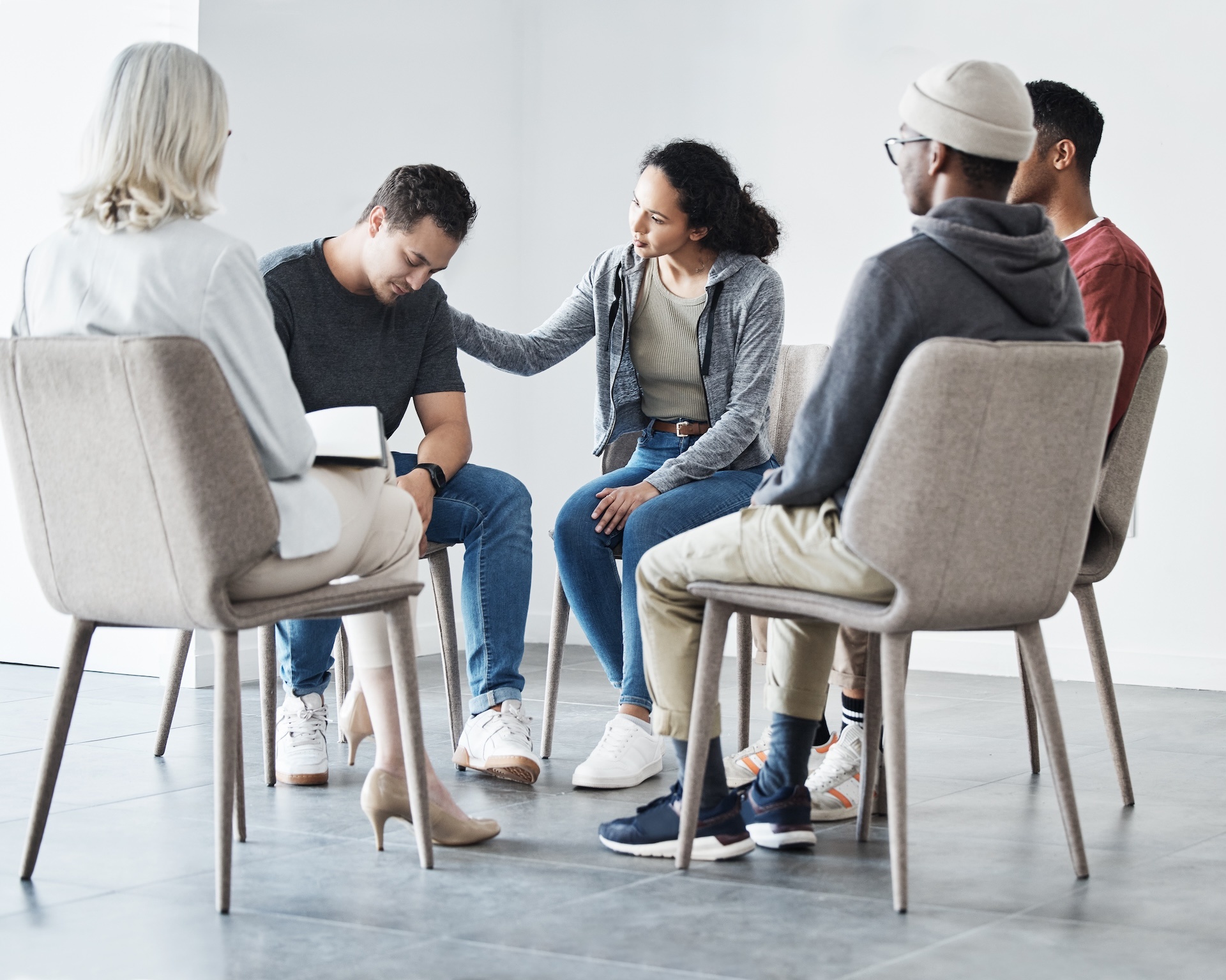 man having a breakdown during group therapy session