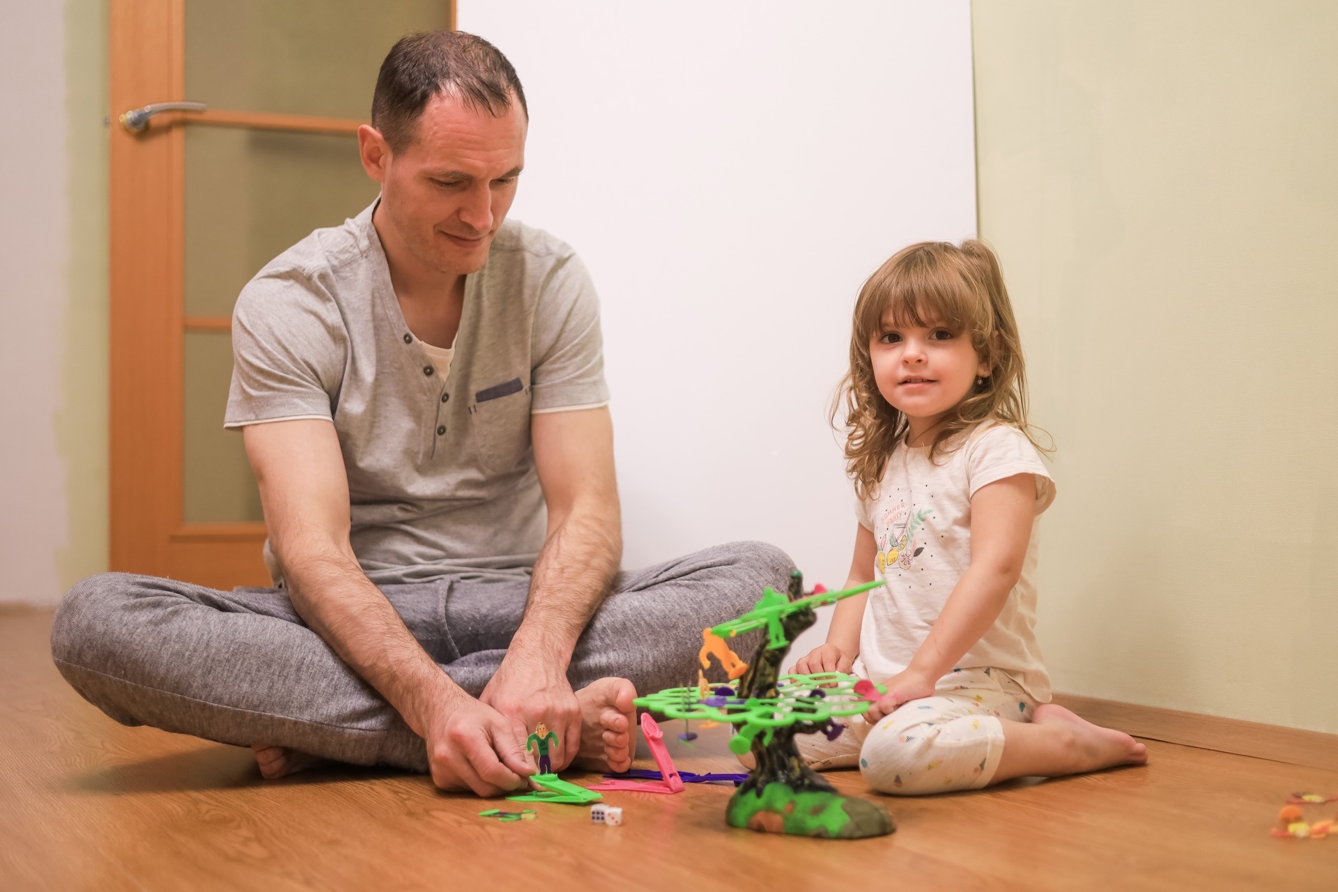 dad-is-playing-with-his-cute-little-daughter-at-ho-2025-01-09-15-28-12-utc