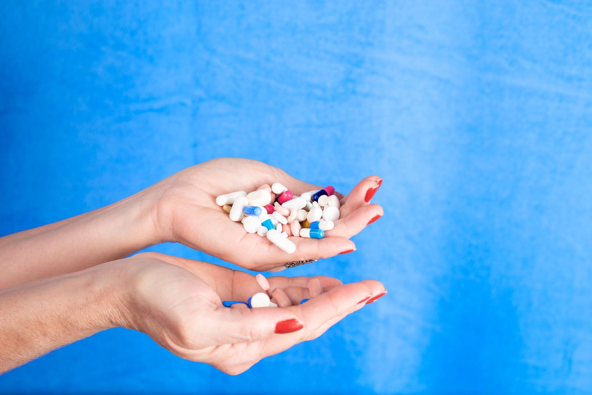 Inpatient rehab: hand full of opiates