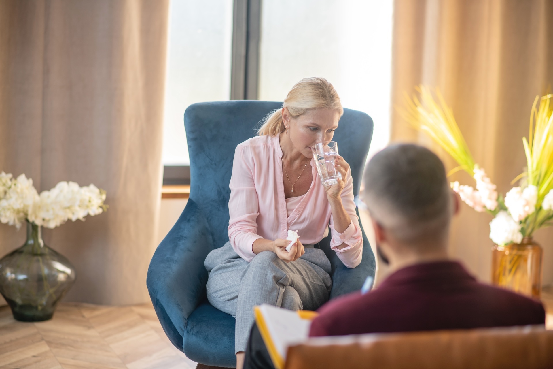 woman-drinking-water-while-feeling-emotional-shari-2024-10-17-22-47-56-utc