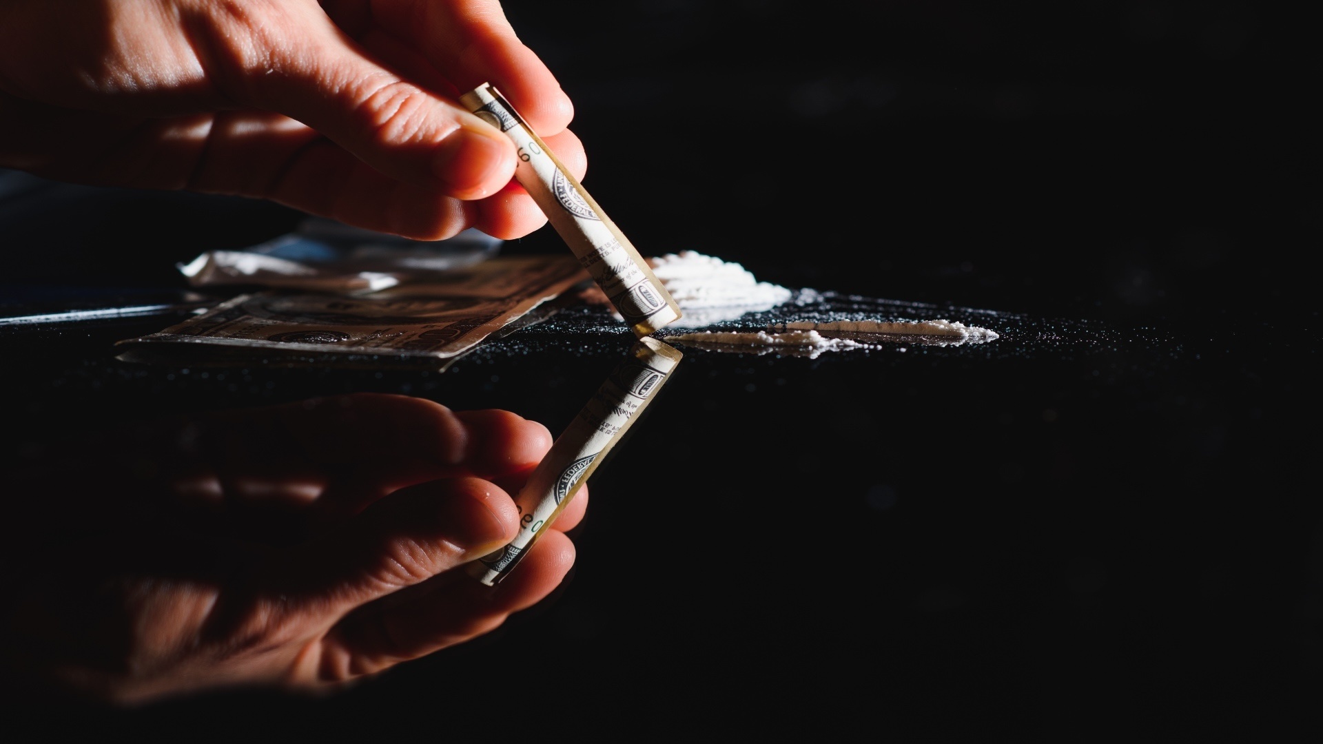 hard-drugs-on-black-table-close-up-2023-11-27-05-13-24-utc (1)