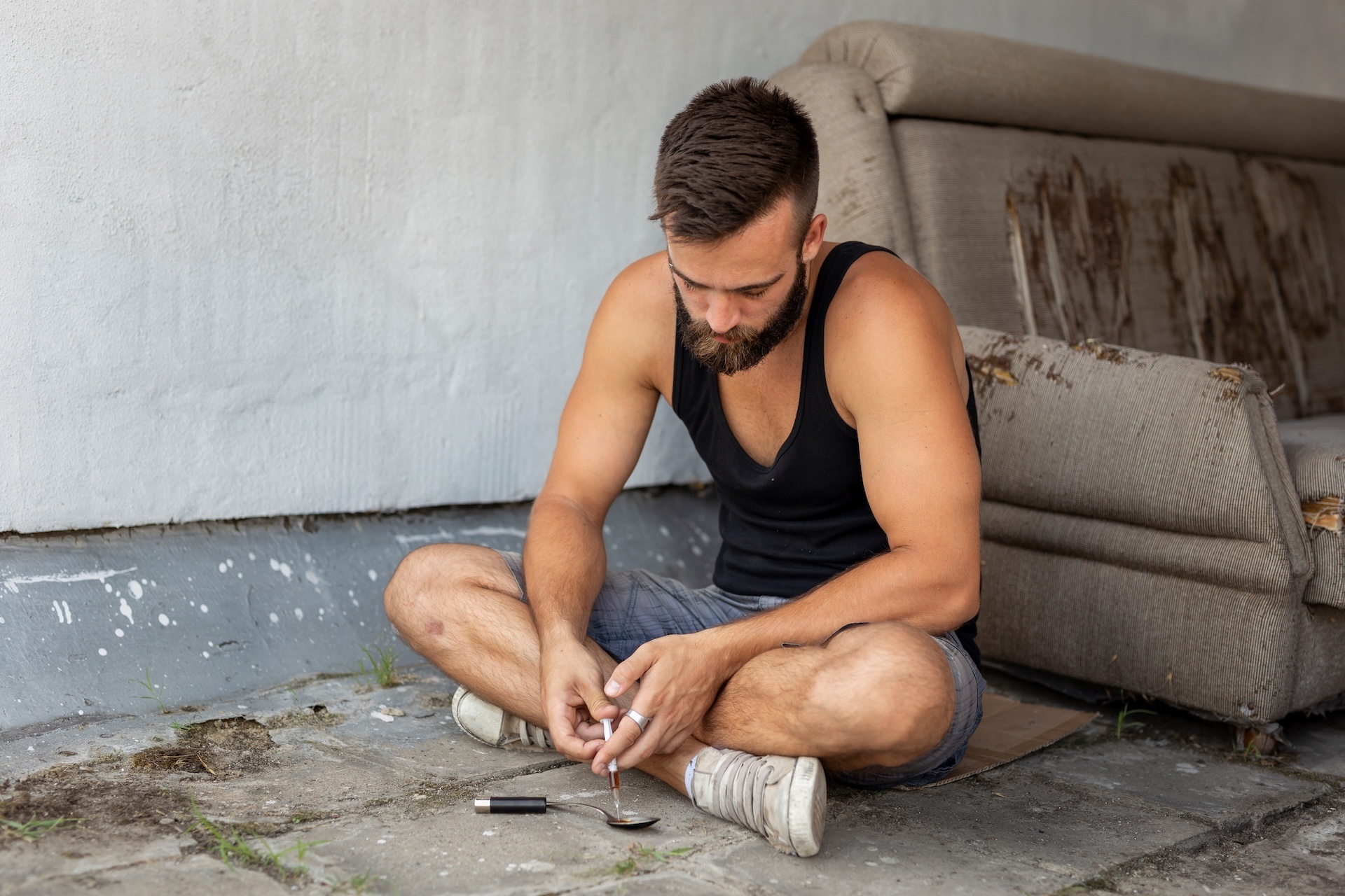 filling-up-a-heroin-syringe-2025-03-13-04-52-06-utc