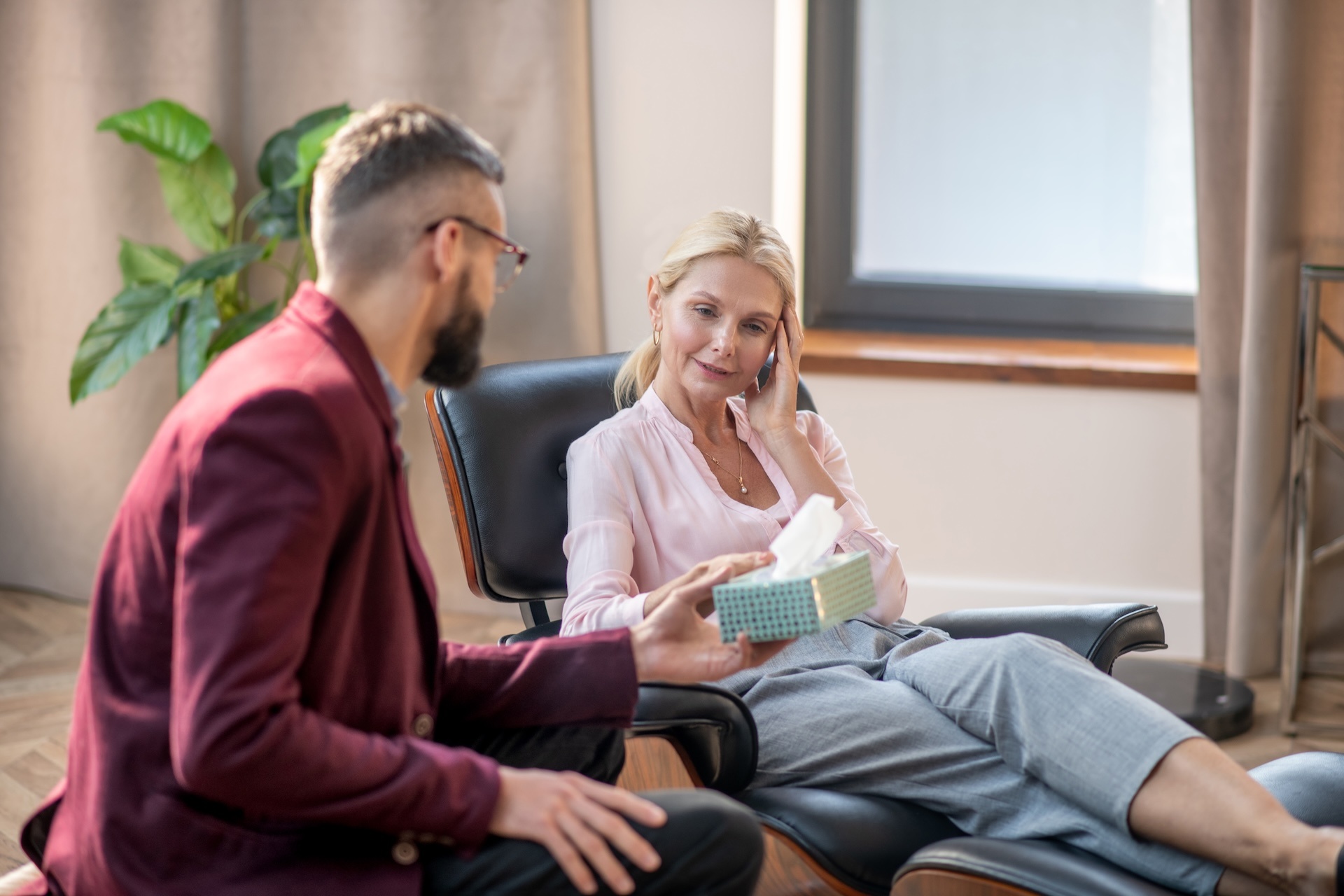 emotional-woman-crying-while-sharing-memories-about