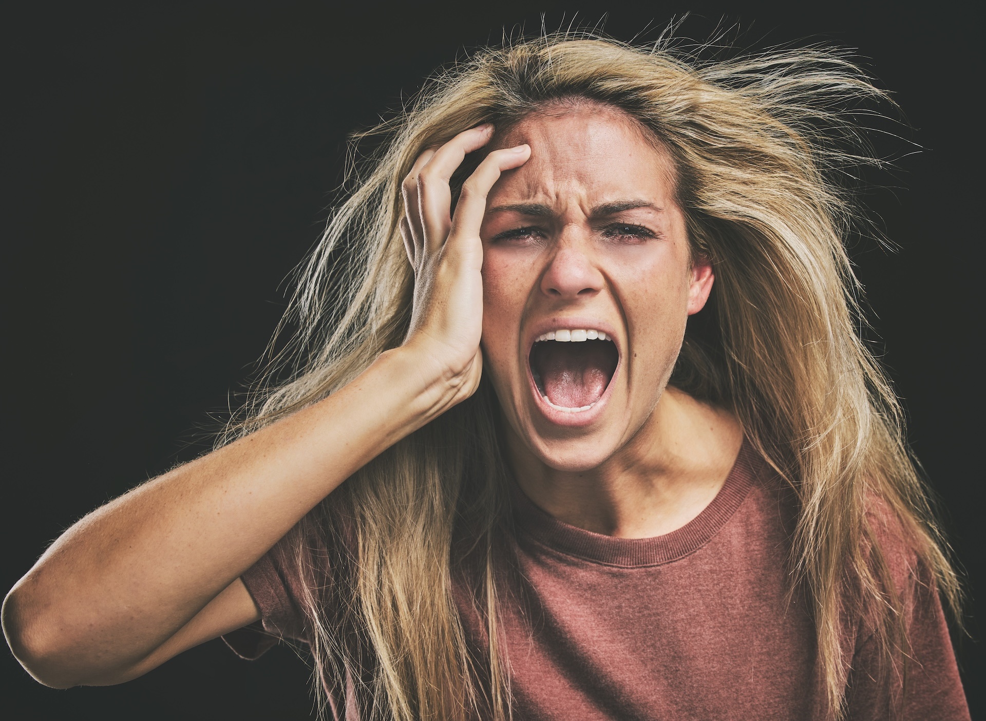 face-mental-health-and-screaming-woman-headache-2025-04-06-06-48-28-utc